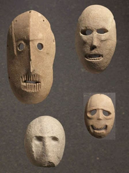 Group of masks. Found in the Judean Hills or Judean foothills. Pre-Pottery Neolithic B, 9,000 years old. Image courtesy of Elie Posner/Israel Museum, Jerusalem.
