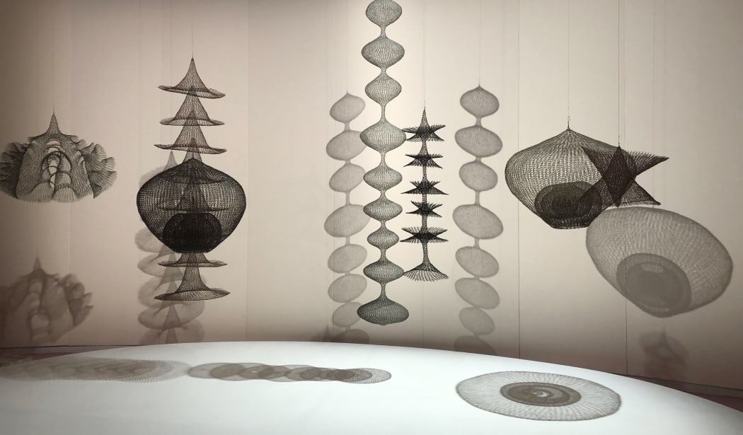 Installation of sculpture by Ruth Asawa