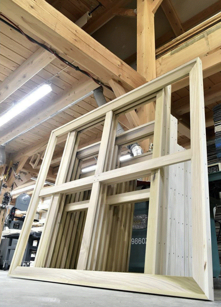 Custom stretcher bars built in Joshua Doub's workshop. Photo courtesy of DoubWorks Instagram