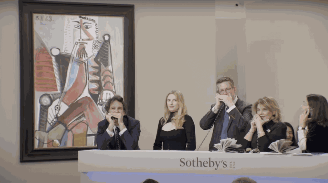 View of the room during the Modern & Contemporary Evening Auction in London at Sotheby's on March 6, 2024. In the background is Pablo Picasso, Homme à la pipe, 1968.