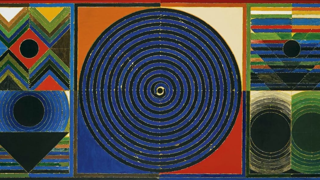 Vibrant S H Raza masterpiece 'Bindu' available for acquisition, showcasing a mesmerizing blue concentric circle symbolizing the seed of life amid a colorful geometric patterned background, reflecting the synthesis of Indian philosophy and modern art.