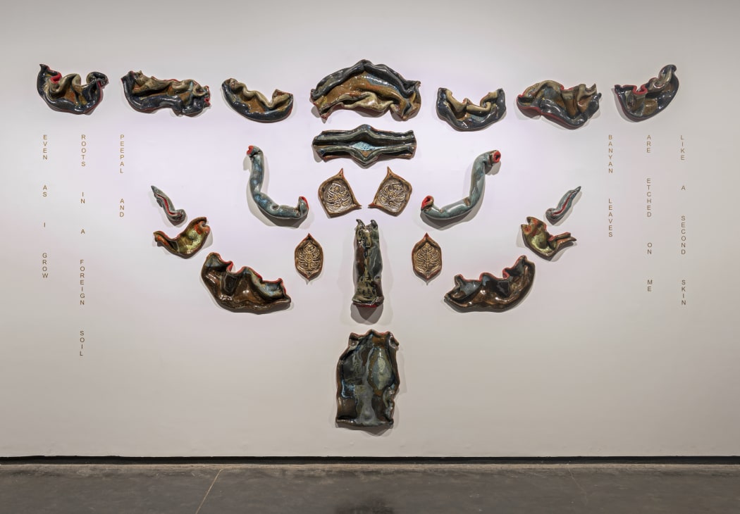 Ashwini Bhat, Self Portrait, Tree of Life, 22 glazed ceramic segments and vinyl text, 10 ft x 16 ft (approx.), 2023