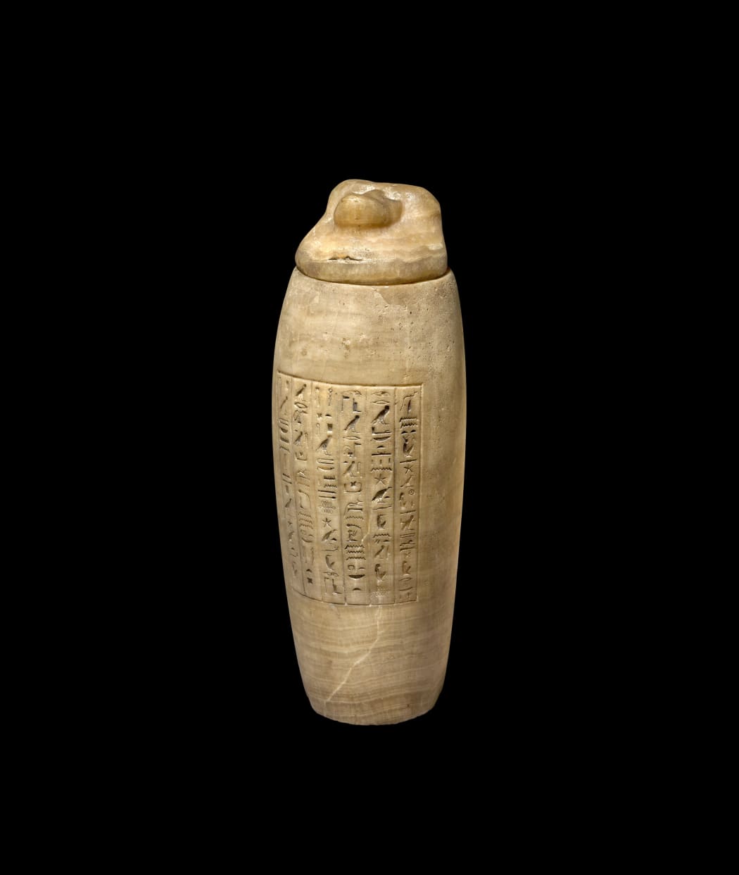 AN IMPORTANT EGYPTIAN ALABASTER CANOPIC JAR FOR PSAMTIK-MEN, THE CHIEF EMBALMER, THE PRIEST WITH A PLEASANT SMELL . Memphis, Saite Period, 26th Dynasty, circa 664-525 BC