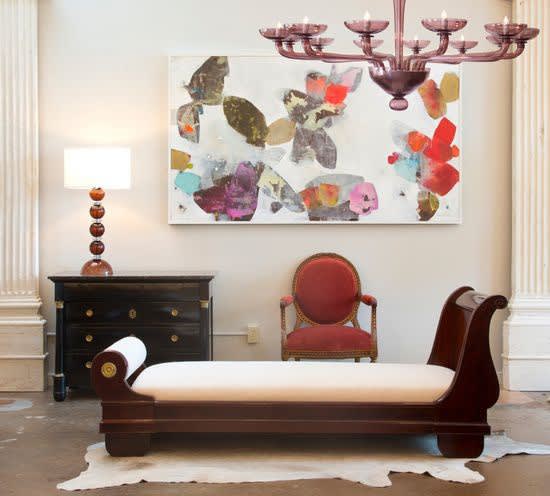 Photograph of a luxurious setting with a work by Meredith Perdue hung on the wall.