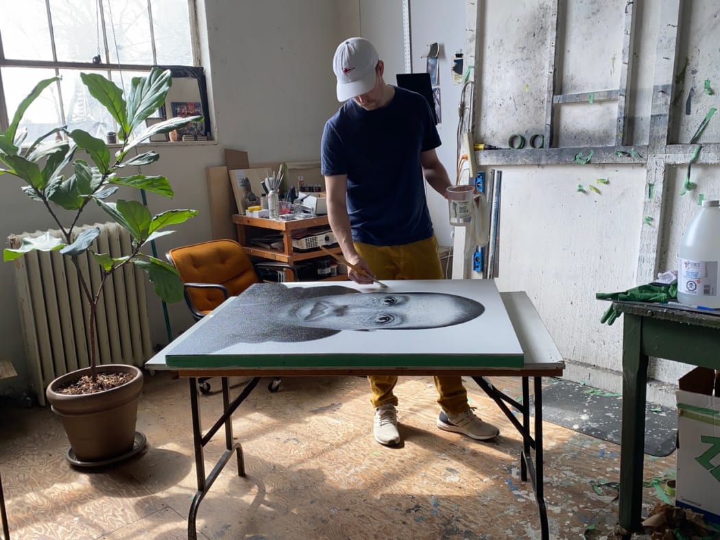 Bierk varnishing Sean during the last day in his studio