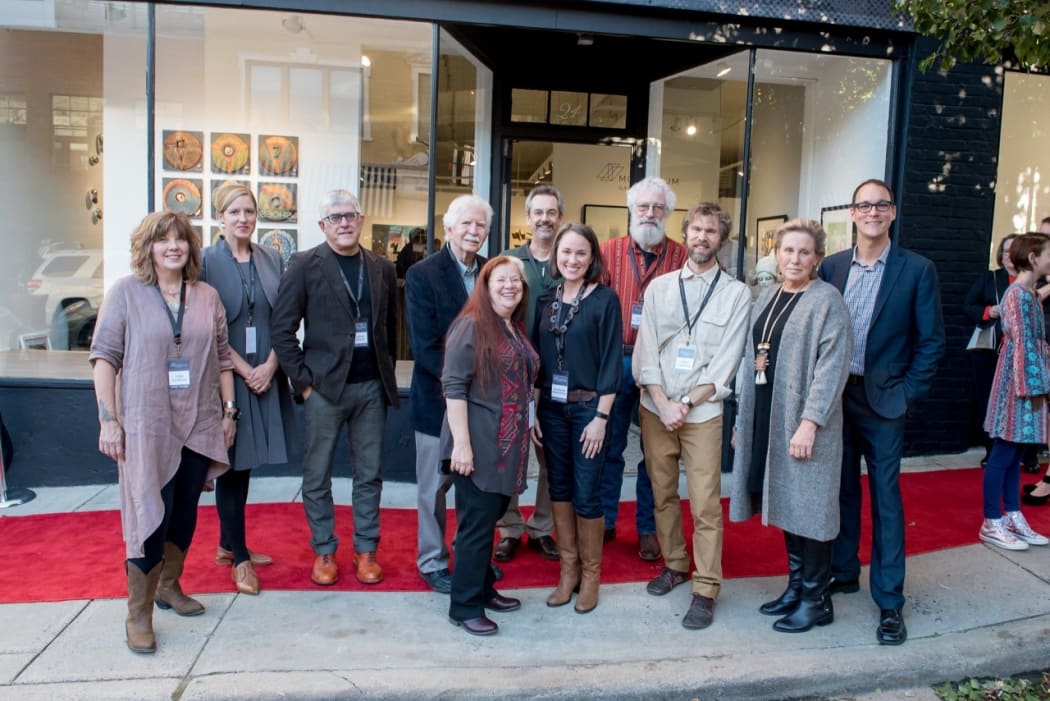 Left to right: Lisa Clague, ceramics; Jennifer Bueno, glass; Hoss Haley, metal; Ron Isaacs, painting; Mariella Bisson, painting; Michael Barringer, painting; Jeannine Marchand, ceramics; David Ellsworth, wood; Andy Farkas, printmaking; Vicki Grant, ceramics; Jordan Ahlers, Owner/Director