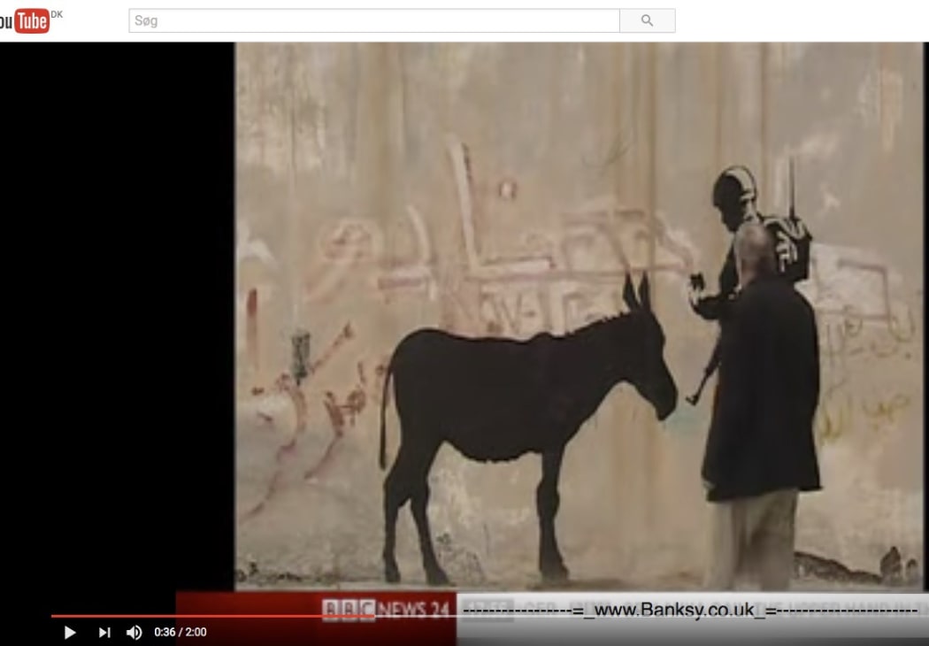 Rare footage from bethlehem where Banksy is interviewed on the works he did there in 2007.