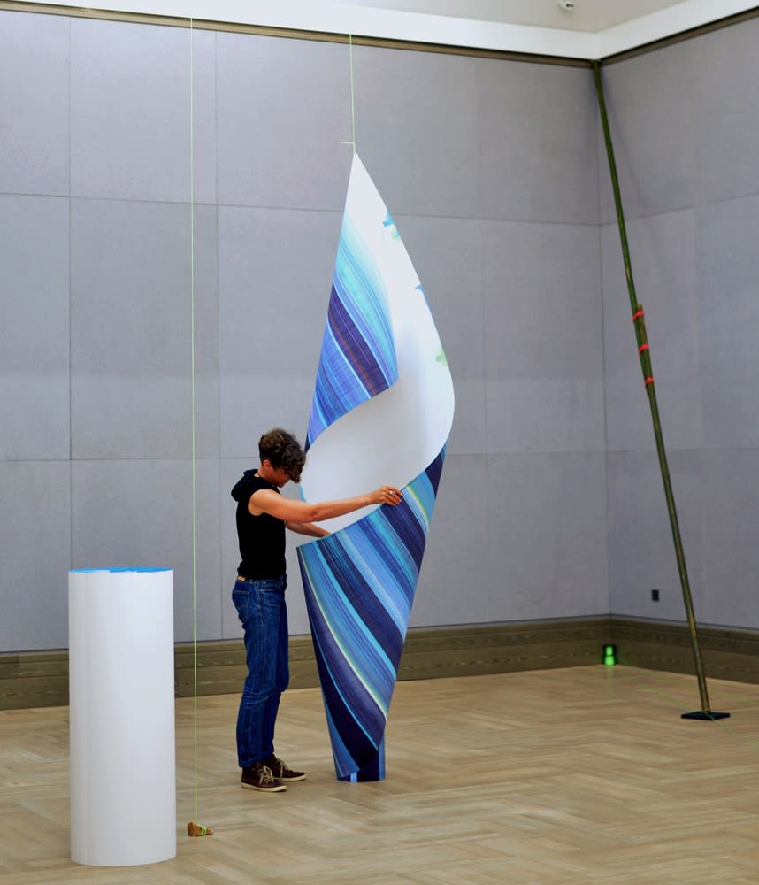 Elisabeth Sonneck installing a scrollpainting. Photo: Yang Rui