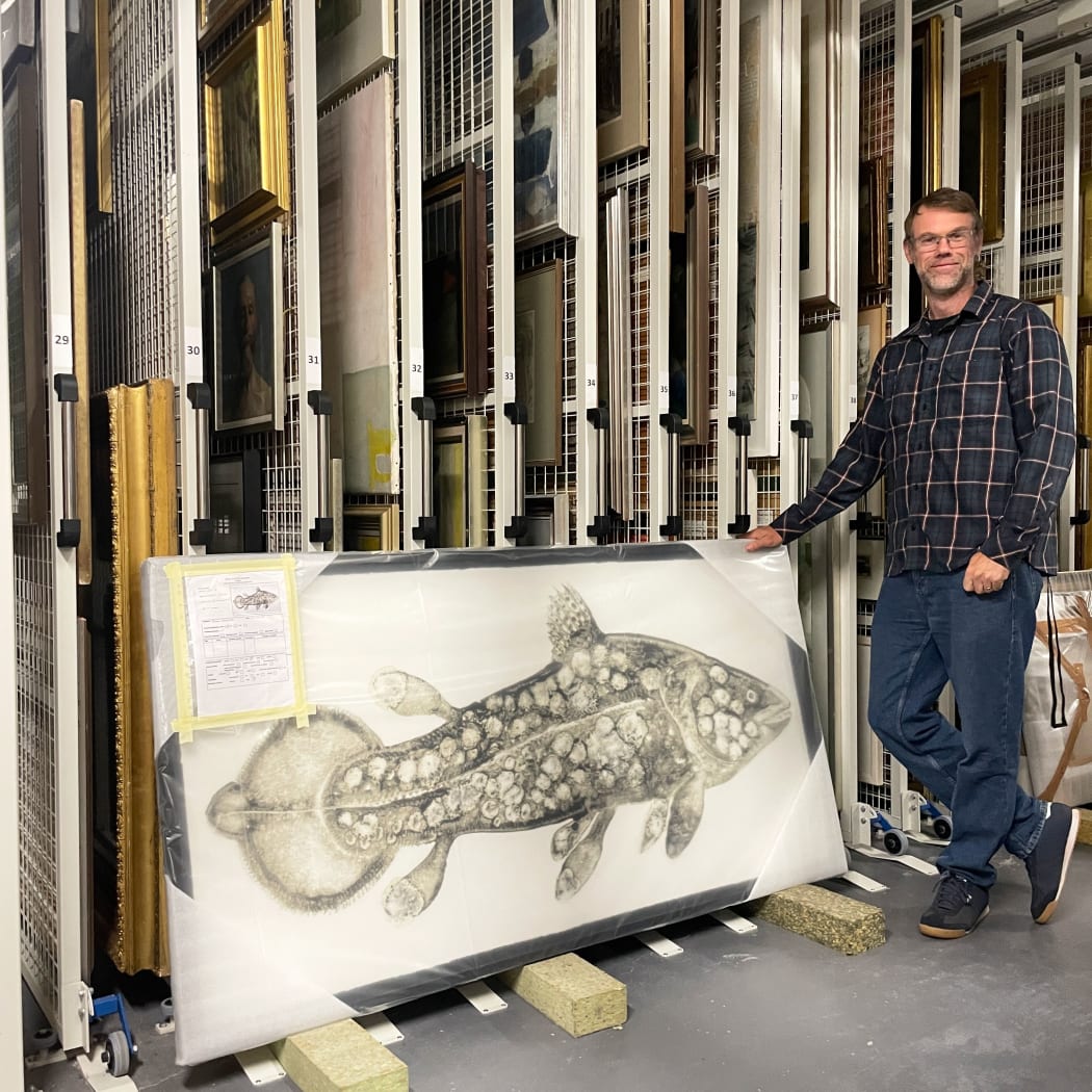 Sandy Wood, Head of Collections, with Species (Coelacanth) II by Stuart MacKenzie RSA, ready to go out on loan to University of Stirling, August 2025