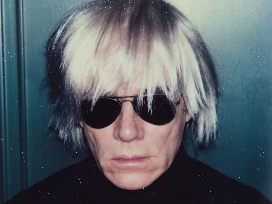 Andy Warhol at the opening of his Self-Portraits exhibition, Anthony d’Offay Gallery, London, July 1986. Photograph by John Wildgoose. © John Wildgoose / The Andy Warhol Foundation for the Visual Arts.