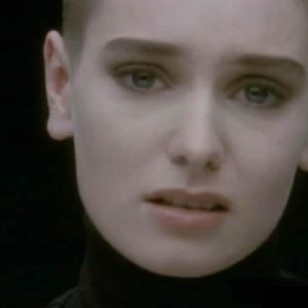 The unforgettable image from the music video of "Nothing Compares 2 U," with a single tear streaming down her face.
