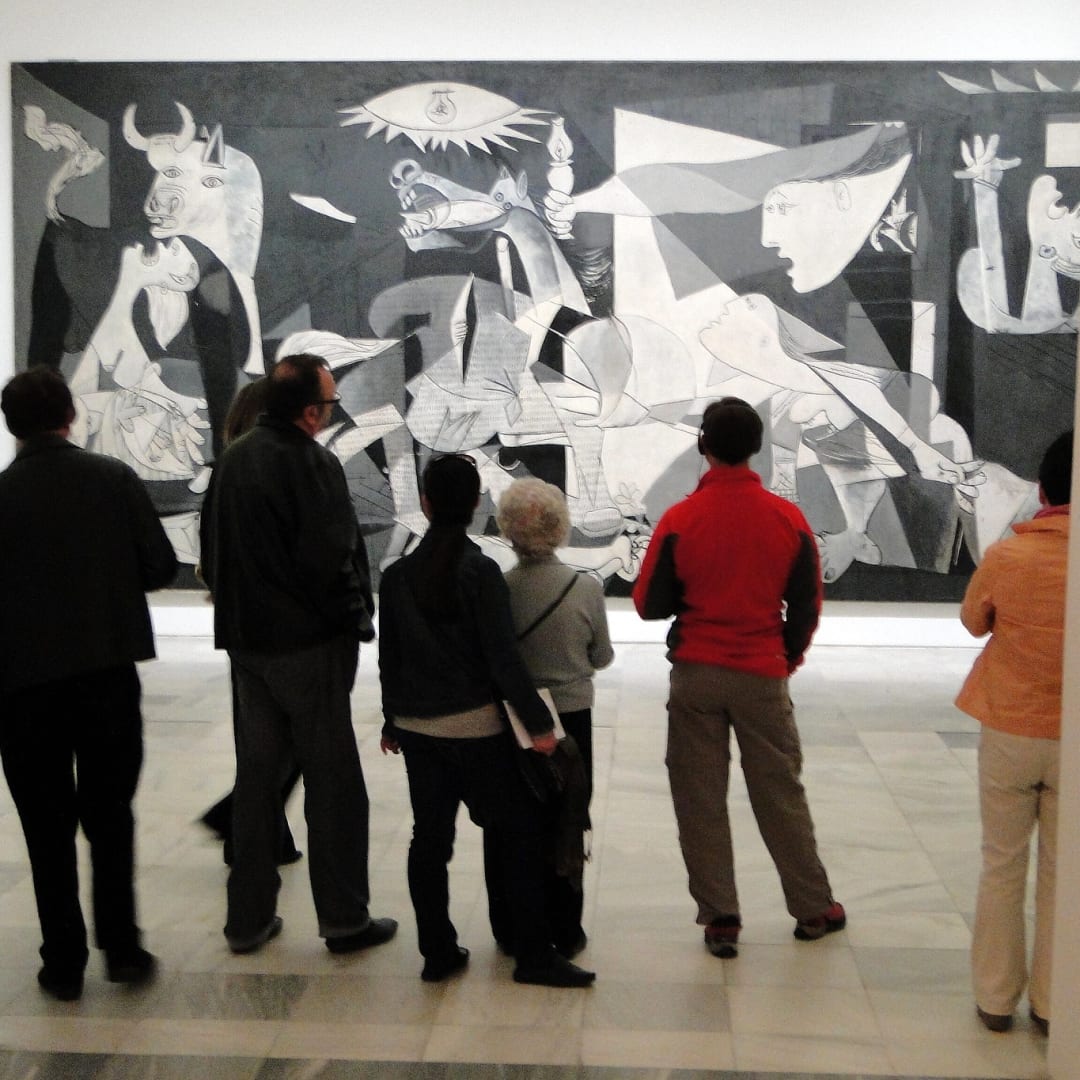 Visitors View Picasso's Guernica - Museo Reina Sofia - Madrid, Spain, May 12, 2010 by Adam Jones, Ph.D. - Global Photo Archive is licensed under CC BY-SA 2.0.