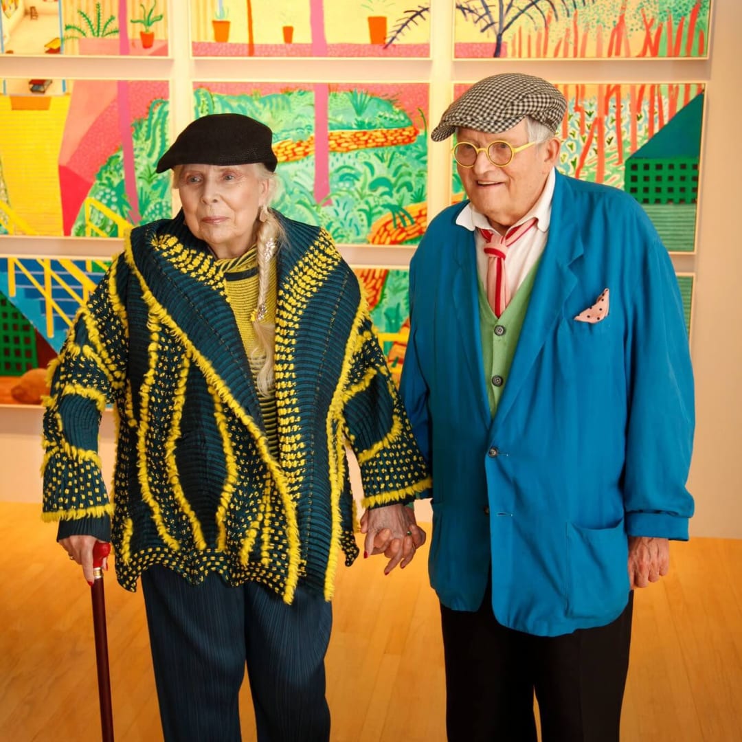 Joni Mitchell and David Hockney at L.A. Louver gallery in Los Angeles "From Valentine's Day this year – that viral photo of Joni Mitchell and David Hockney holding hands at the LA Louver gallery in California. Pic by Jacob Sousa." by Fresh On The Net is licensed under CC BY 2.0.