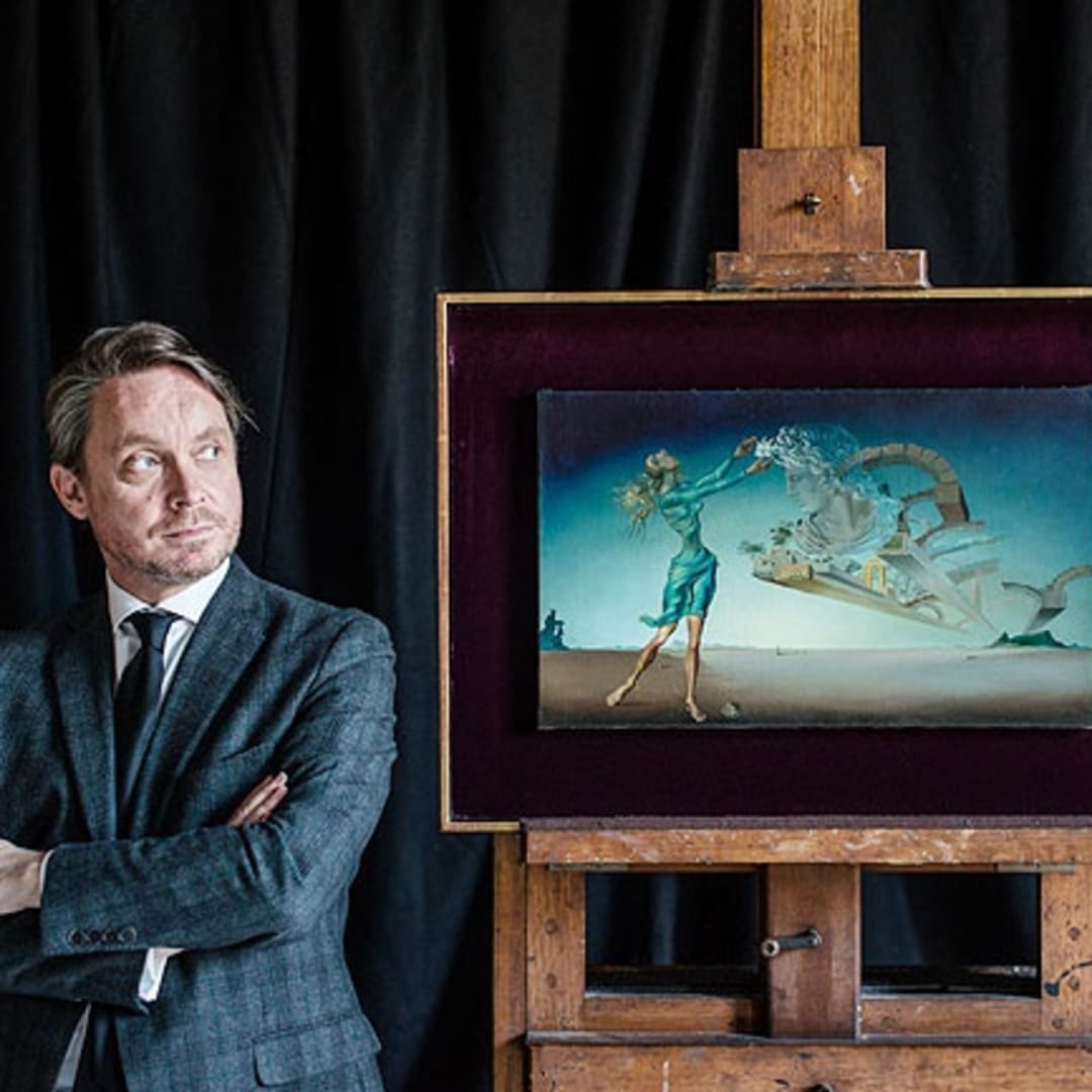 National Gallery of Victoria director Tony Ellwood with Dali’s work, Trilogy of the desert: Mirage Photo: Georgia Logan for NGV
