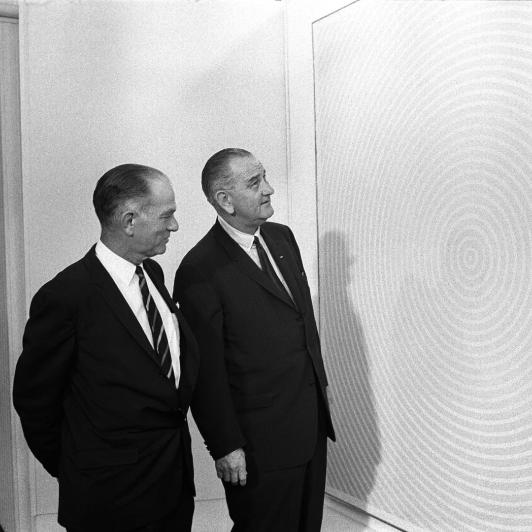 U.S. President Lyndon Baines Johnson and U.S. Senator J. William Fulbright inspect "Squaring the Circle", a bright red 1963 painting by Richard Anuszkiewicz, at the 1965 White House Arts Festival. Image: Public Domain