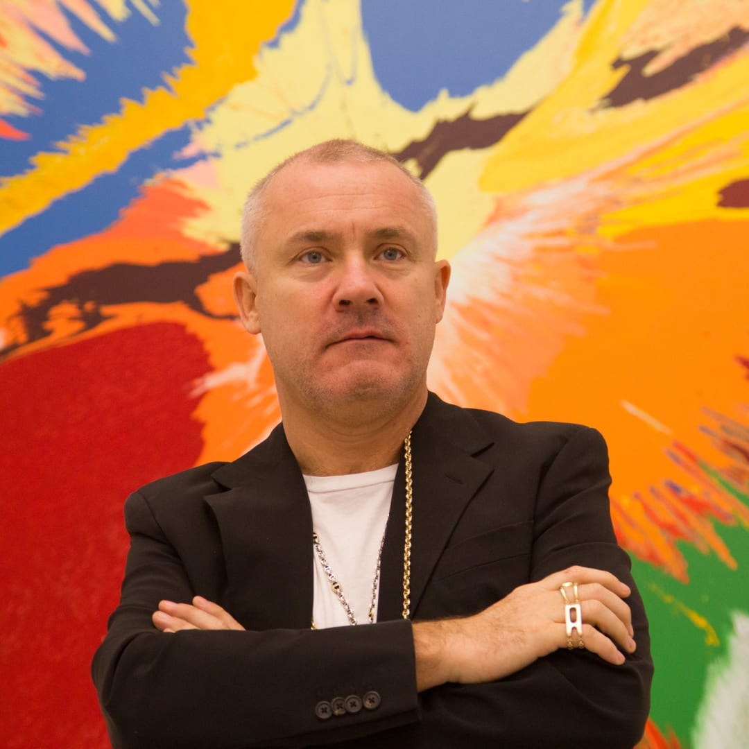 Damien Hirst, Doha 2013 by Gazanfarulla Khan is licensed under CC BY-ND 2.0. Damien Hirst's NFT paintings may or may not go up in flames.