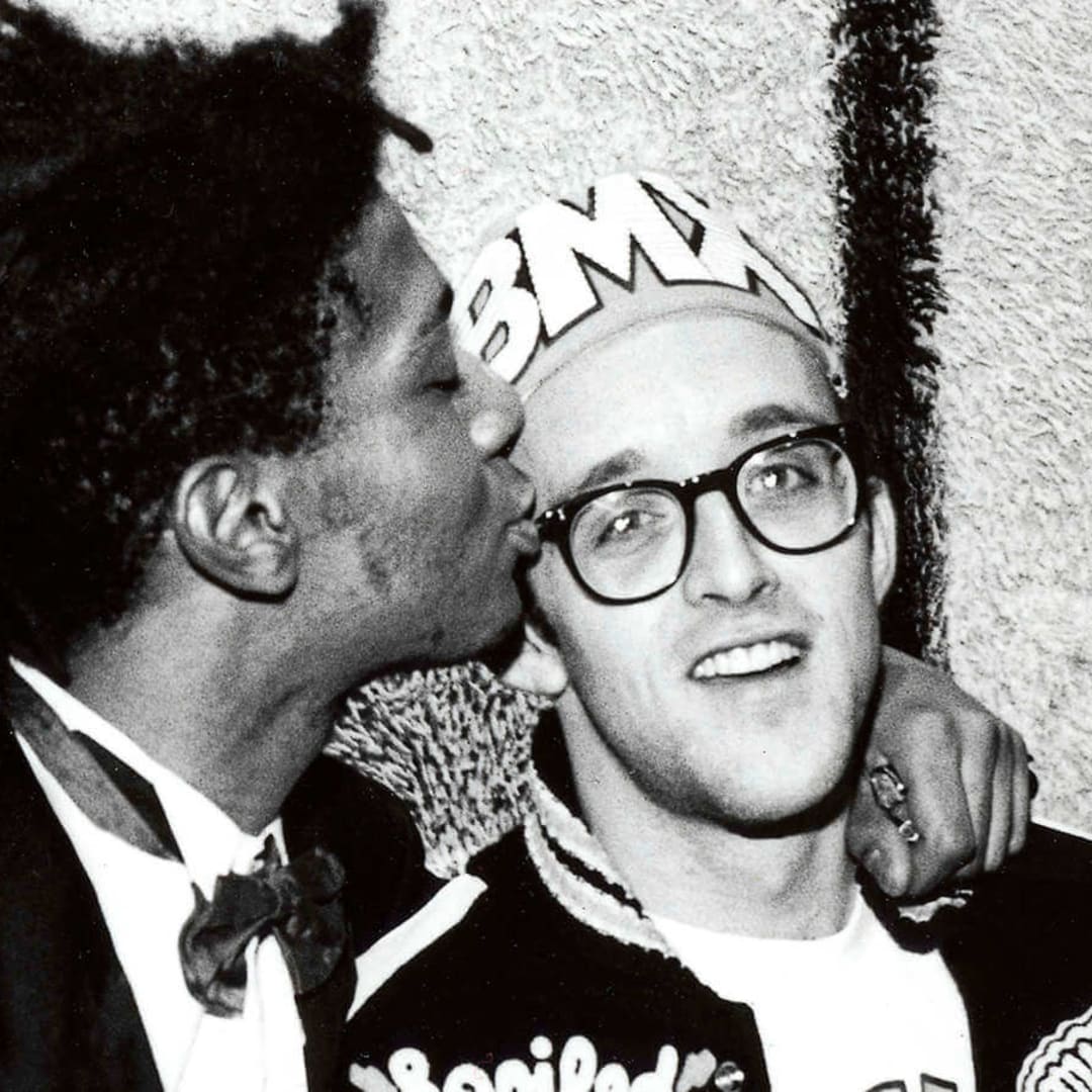 Jean-Michel Basquiat, left, and Keith Haring at the opening reception for Julian Schnabel at the Whitney Museum of American Art, New York, 1987. Credit: George Hirose