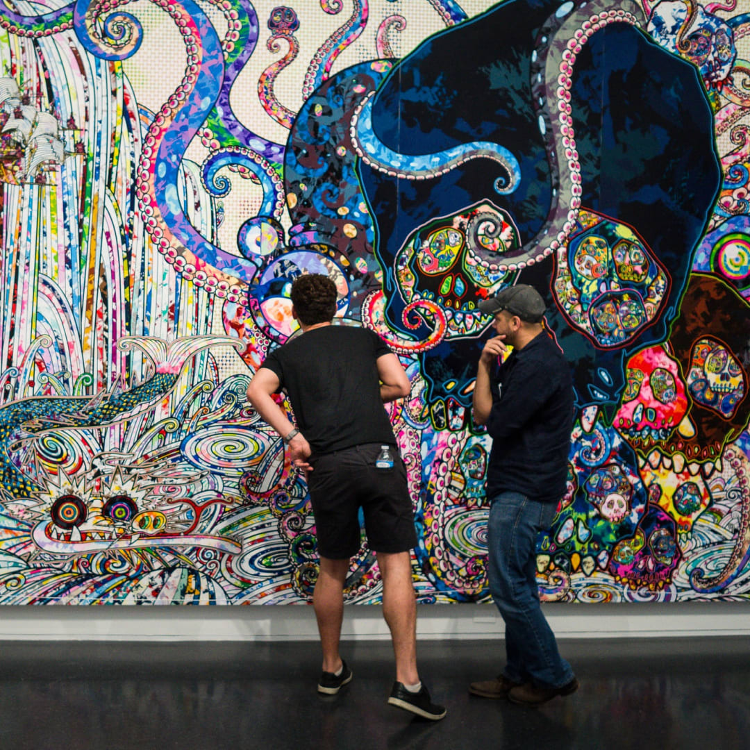 Two visitors to the Museum of Contemporary Art take a closer look at a work by Takashi Murakami, July 15, 2017 "A Closer Look" by Phil Roeder is licensed under CC BY 2.0.Save Changes