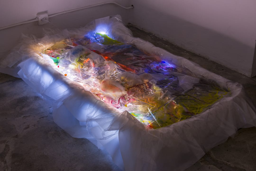 Samara Scott Marshes V, 2016 Bed frame, plastic sheeting, mixed media, strip lights, water 130 x 210 x 221 cm
