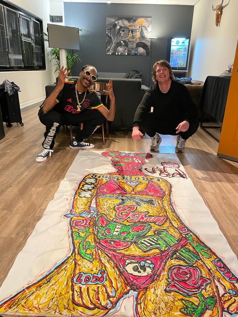 Lieuwe van Gogh presents his painting 'G Thang' to Mr Snoop Dogg