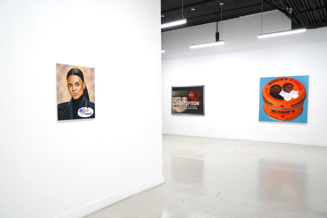 photograph of the gallery with paintings on the walls