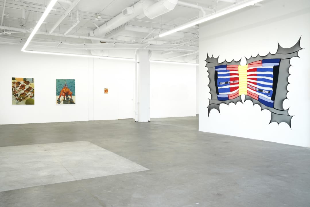 photo of the gallery with artwork on the walls