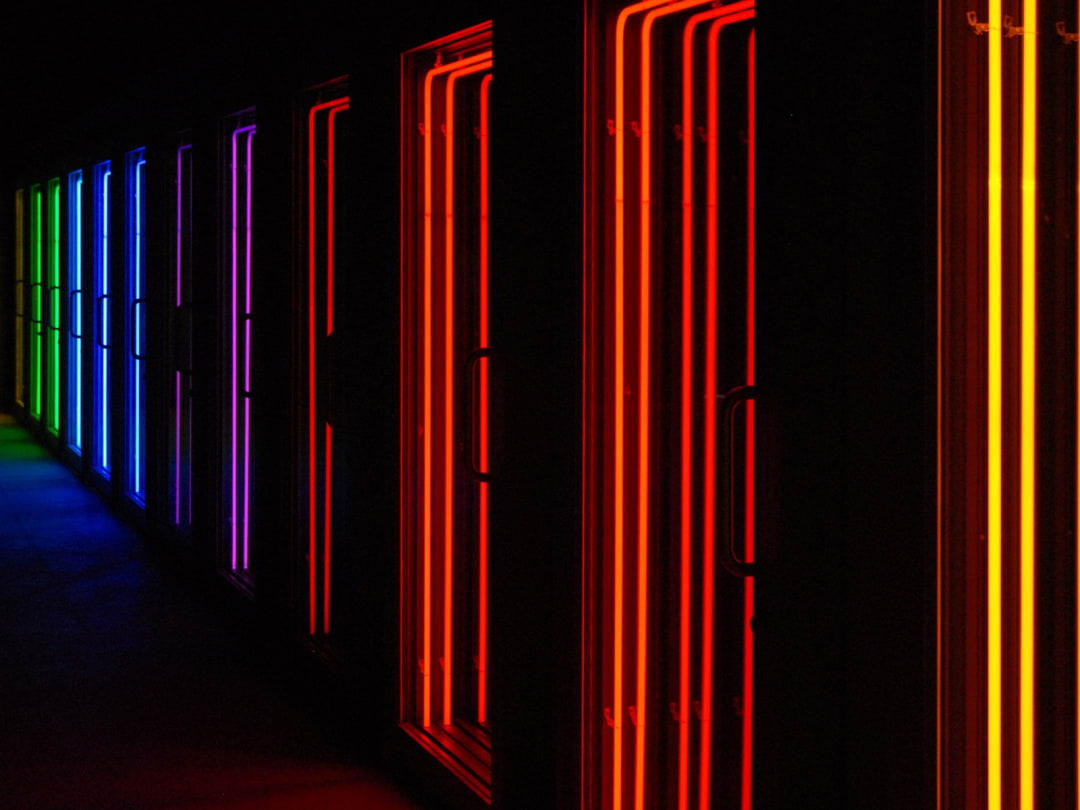 Ivan Navarro, Death row. 2006 Neon light, 13 separate aluminum doors, mirrors. Taken on July 18, 2009. Photo by dalbera is licensed under CC BY 2.0.