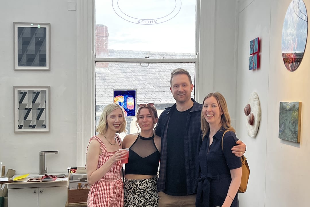 Artists / Curators Eleanor Hawkes, Julia Pomeroy, Joss Cole and Fiona Grady with Fiona's framed prints