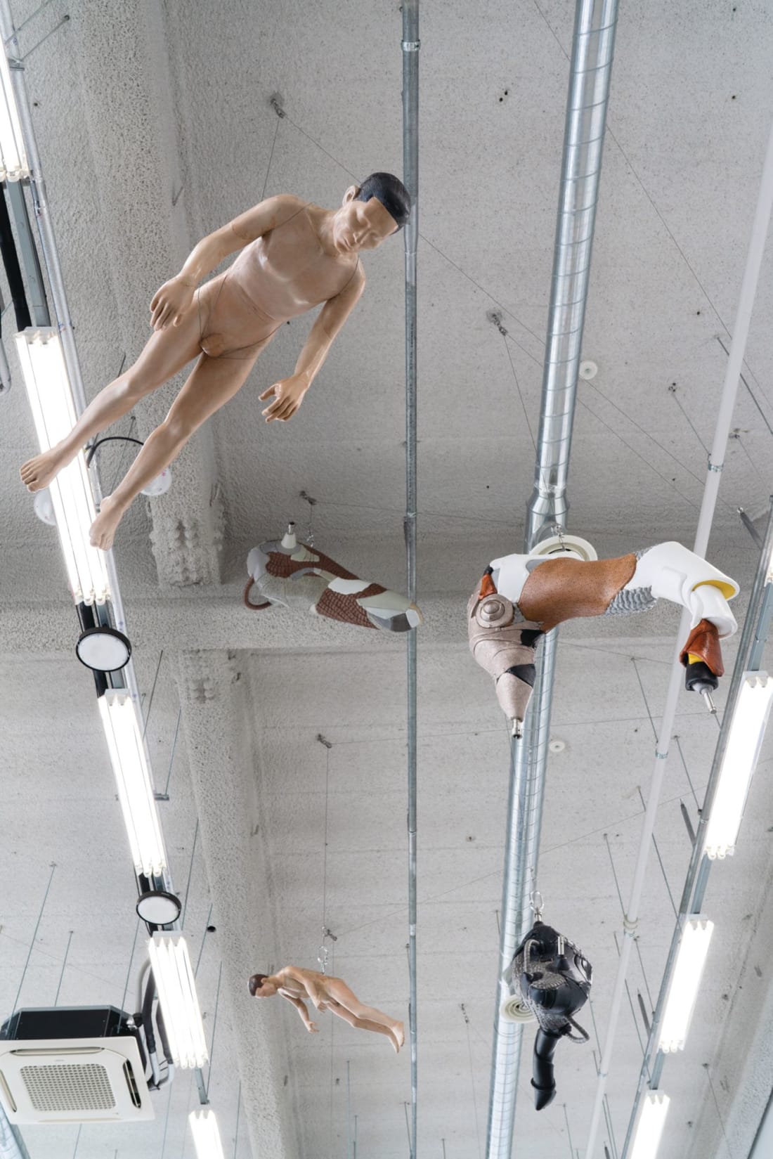 Sculptures and mannequins hang from the ceiling in Lee’s larger studio in Samsong, Seoul. (Photo: Tim Franco for Tatler Hong...
