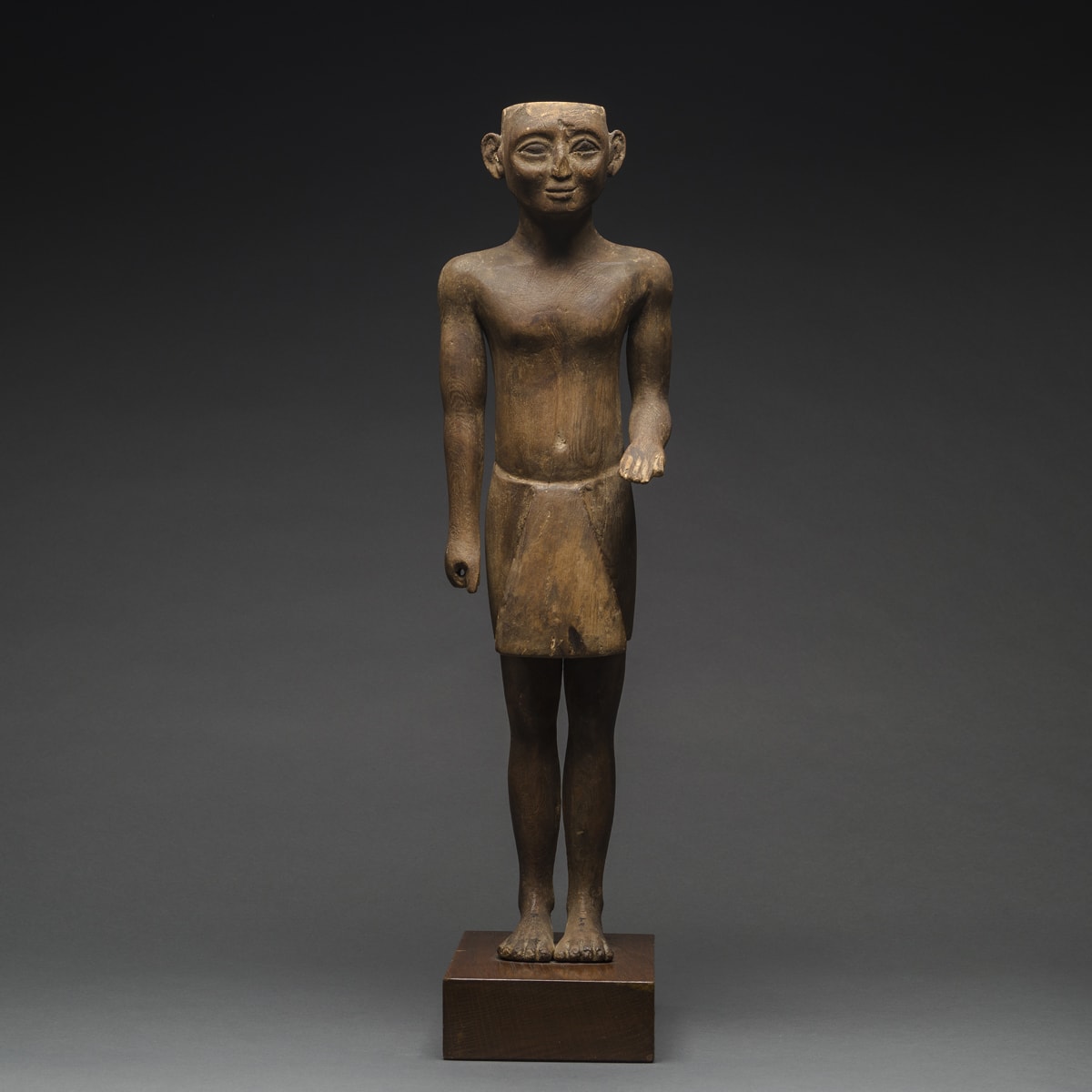 New Kingdom Wooden Sculpture of a Standing Man, 1570 BCE