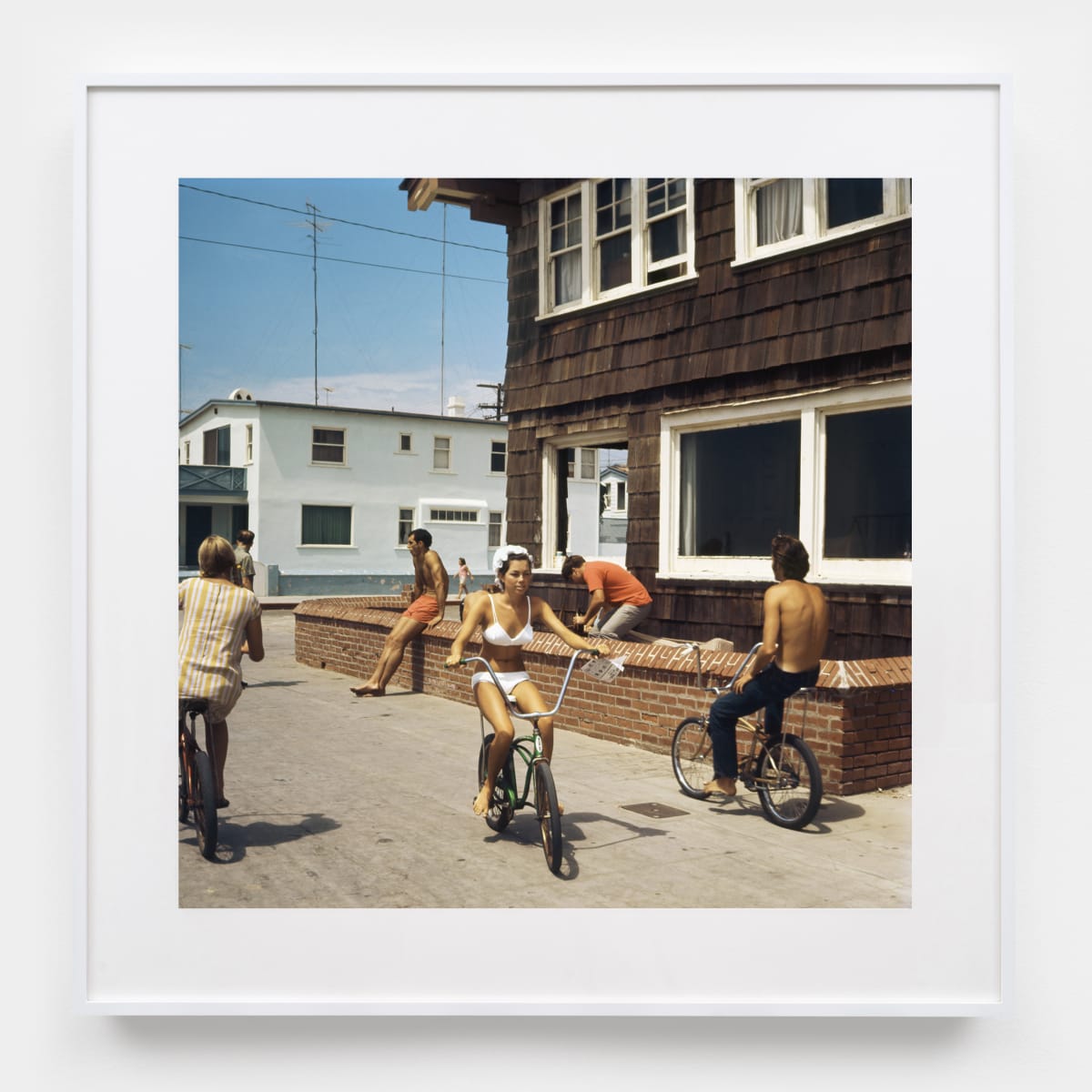 Framed Poster - Sidewalk Surfer, Huntington Beach, 1976 by Hugh Holland
