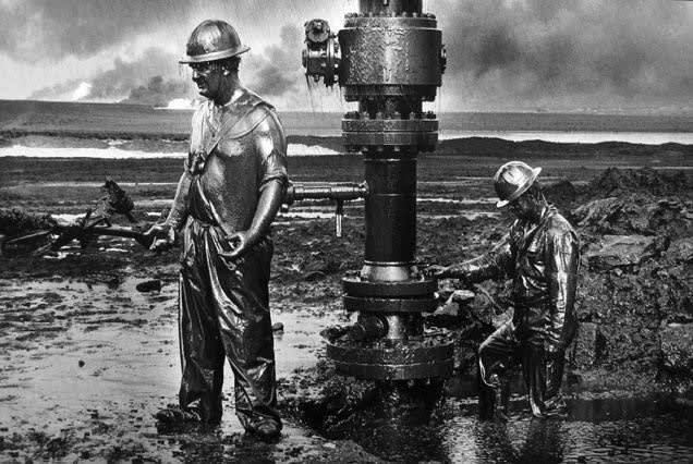 Sebastião Salgado, Workers install a new wellhead to enable the