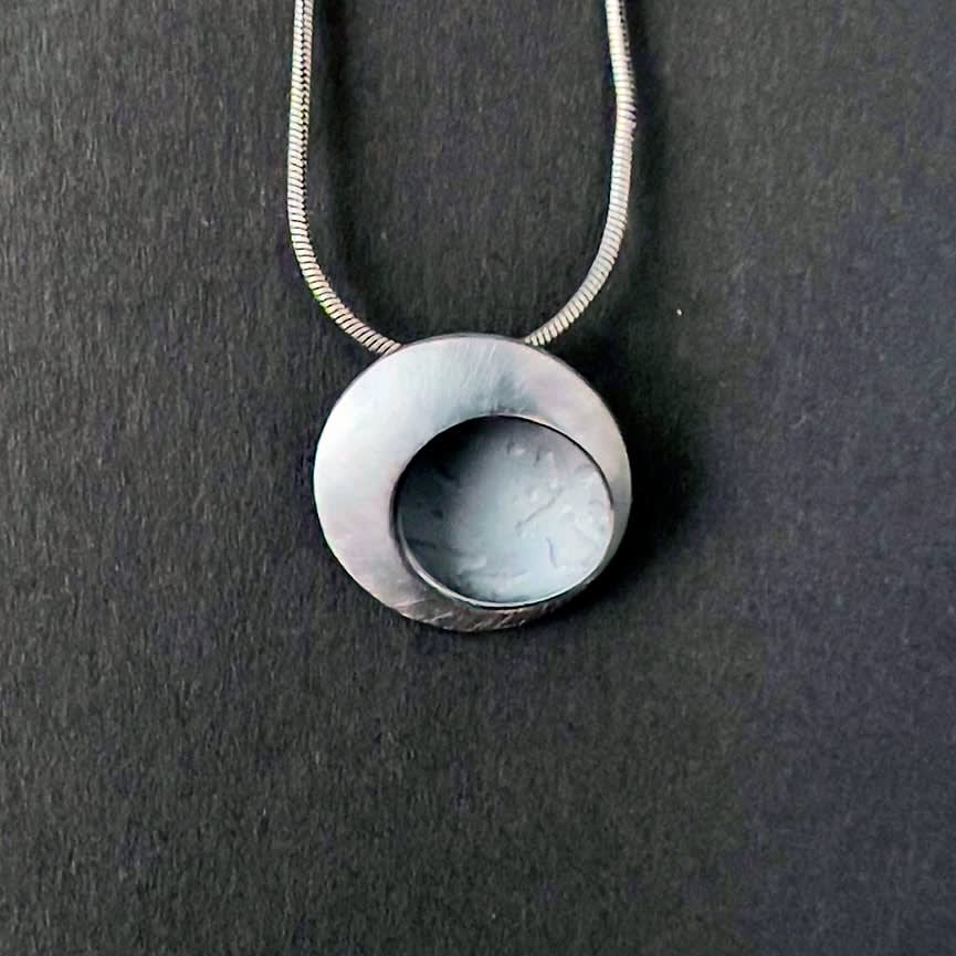 Tiny oxidised etch pendant , 2024