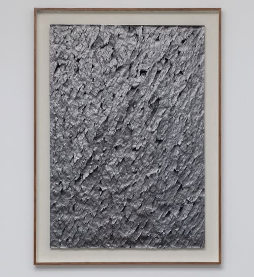 Ballpoint Pen Turns Newspaper into a Dark Abyss