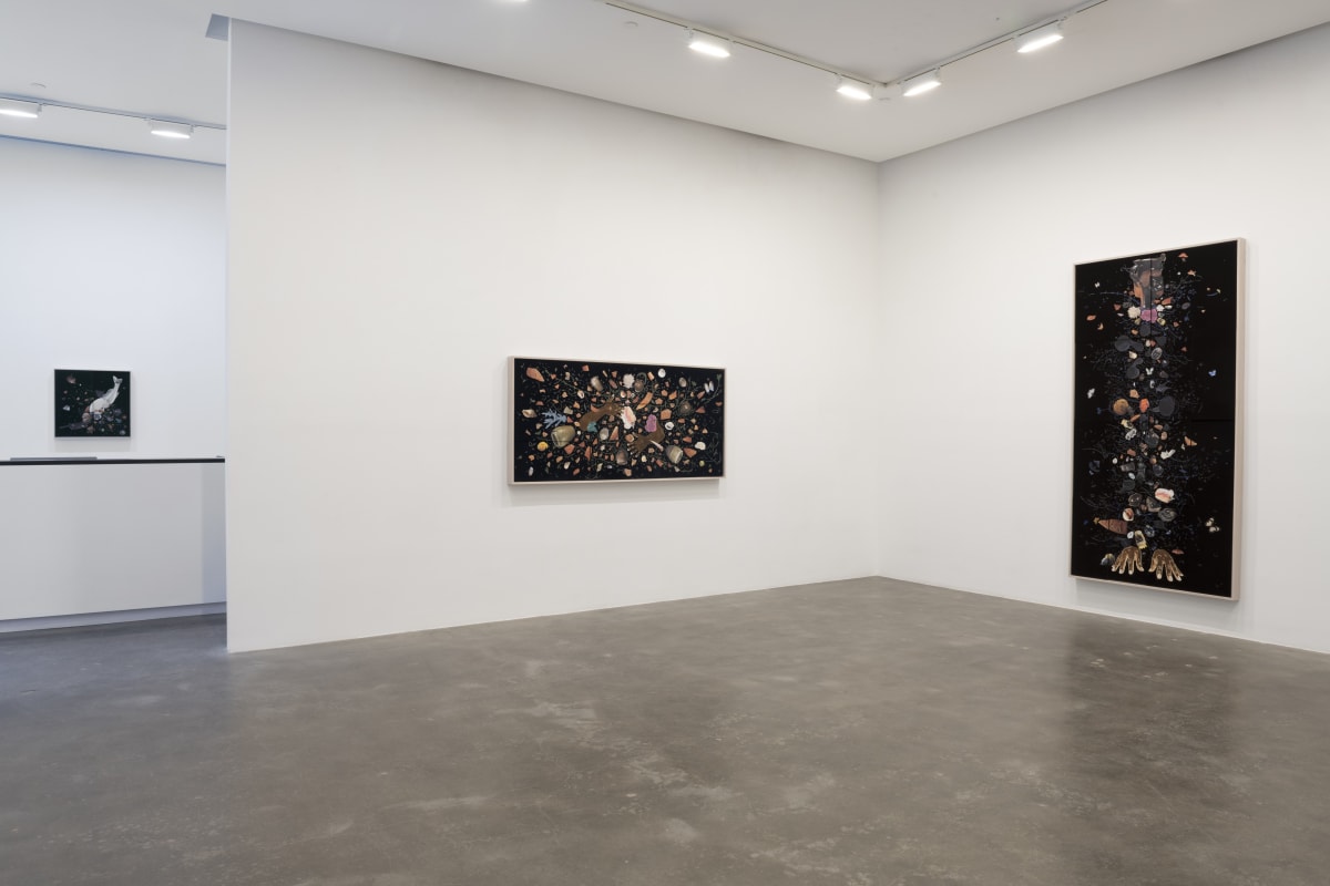 Installation view of three dark collages by William Villalongo installed on white walls at Susan Inglett Gallery