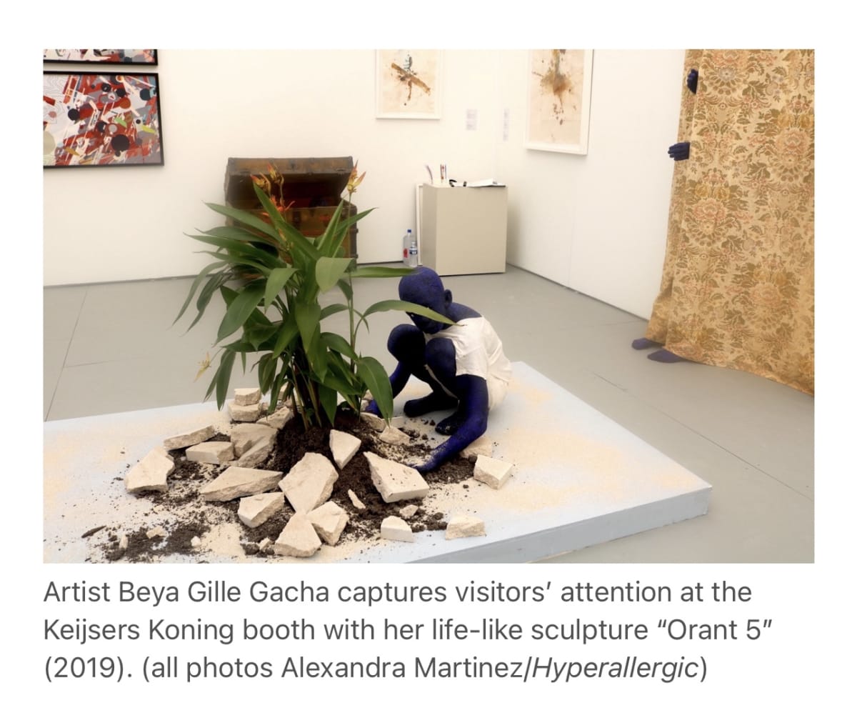 image of the booth at Untitled, with sculptural work by Beya Gille Gacha