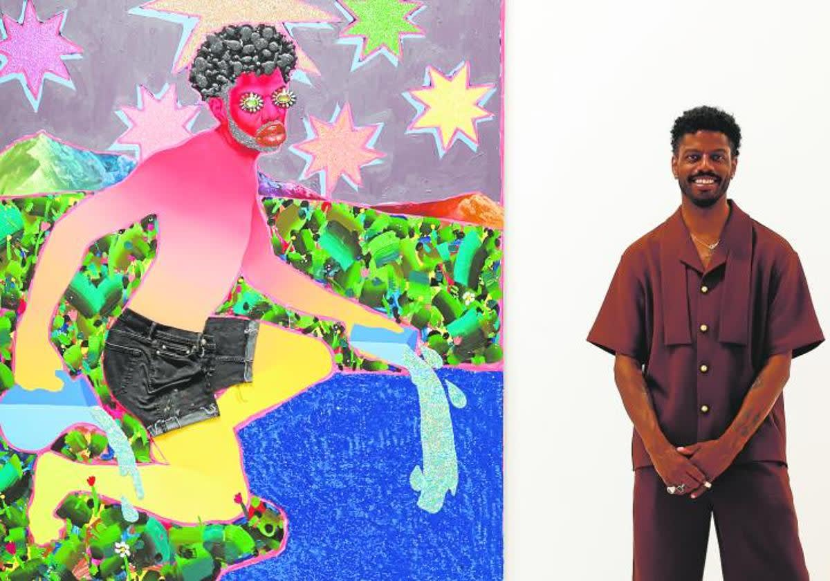 Devan Shimoyana in front of his painting, The Star. Image courtesy of Ñito Salas.