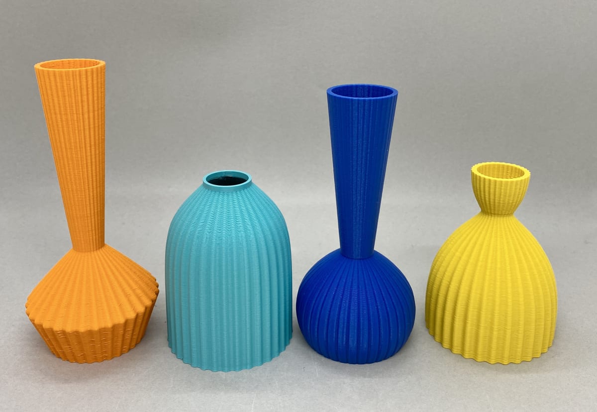 A collection of pots by the designer Keeley Traaee in assorted colours, shapes and sizes
