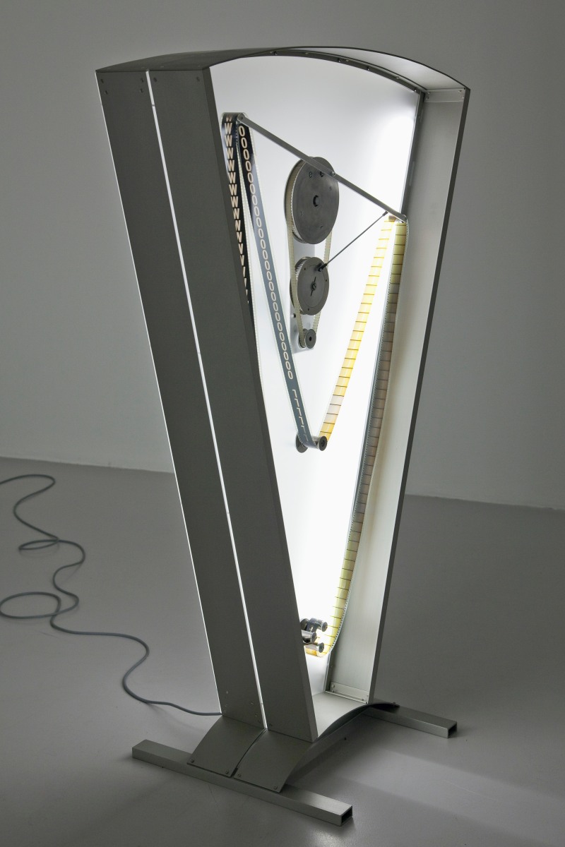 Rosa Barba Color Clock (yellow): Verticals Lean Occasionally Consistently Away from Viewpoints, 2012 35 mm film, motor, aluminum, Plexiglas Edition of 3