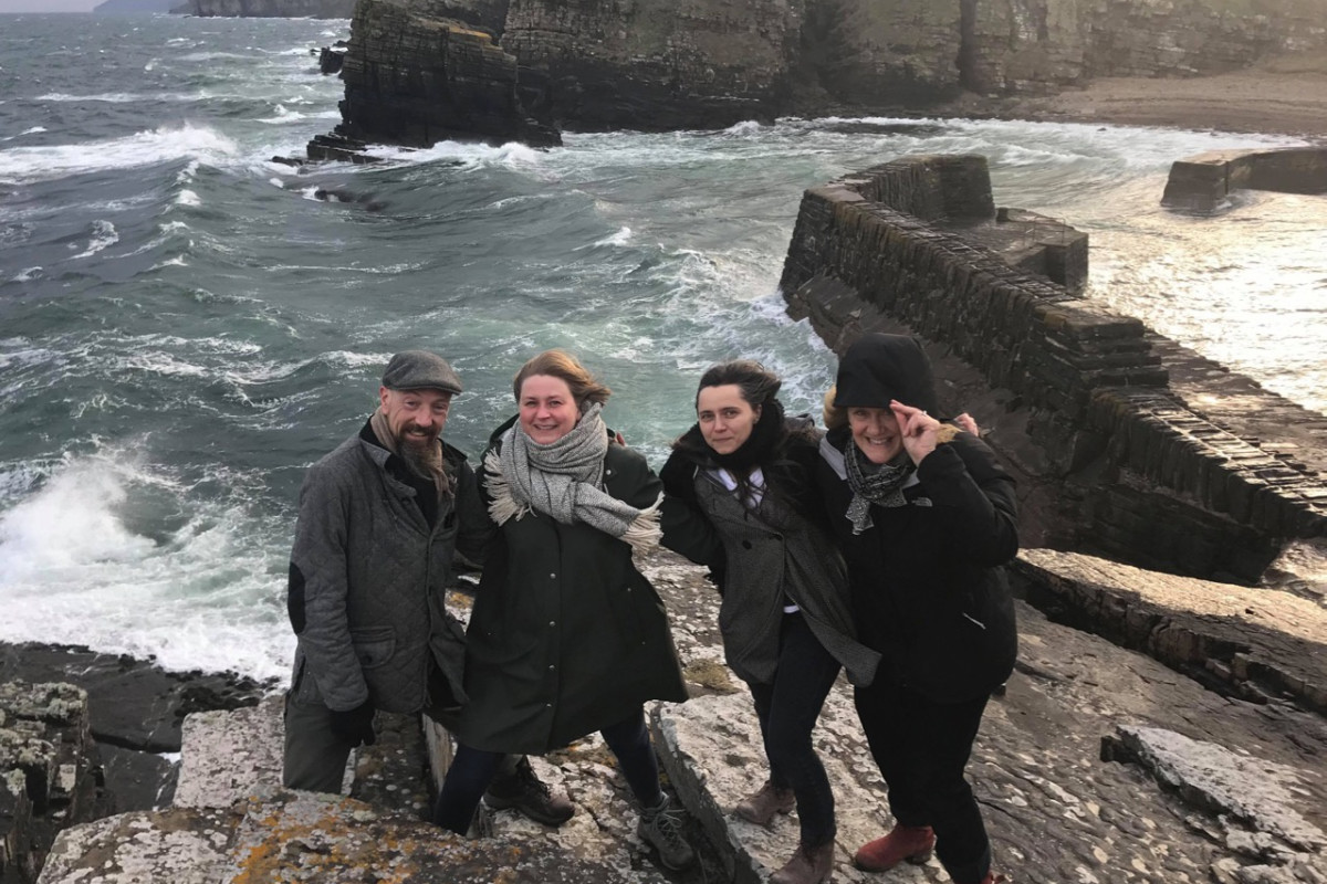 Artists Jeff Zimmer, Anne Vibeke Mou, Anne Petters, and Annie Cattrell at Latheronwheel Harbor; photo by K. Sutherland.
