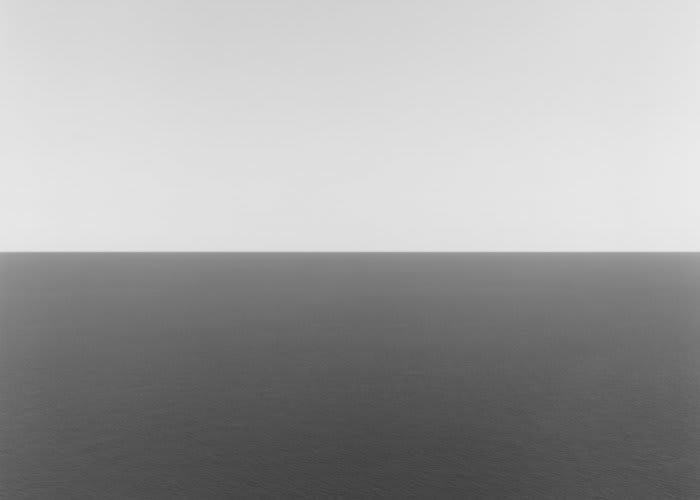 Black and white photograph of a seascape.