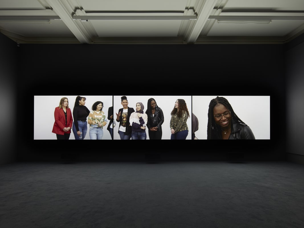 An image containing a film screening by Rineke Dijkstra