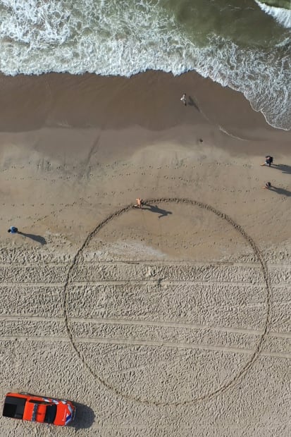 Running a Circle on a Crowded Beach, 2020