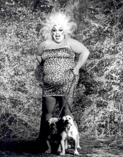 Greg Gorman, Divine with 2 bulldogs, 1984, Bw print Courtesy of Jerome Jacobs, Brussels