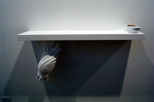 asianpunkboy Untitled 4 (Owl), 2003 Plastic owl, 444 carat cubic zirconium stones, engraving, acrylic & flat household paint, wood shelf, ceramic bowls, birdseed and water 43 ¼ x 24 x 10 ¼ inches.