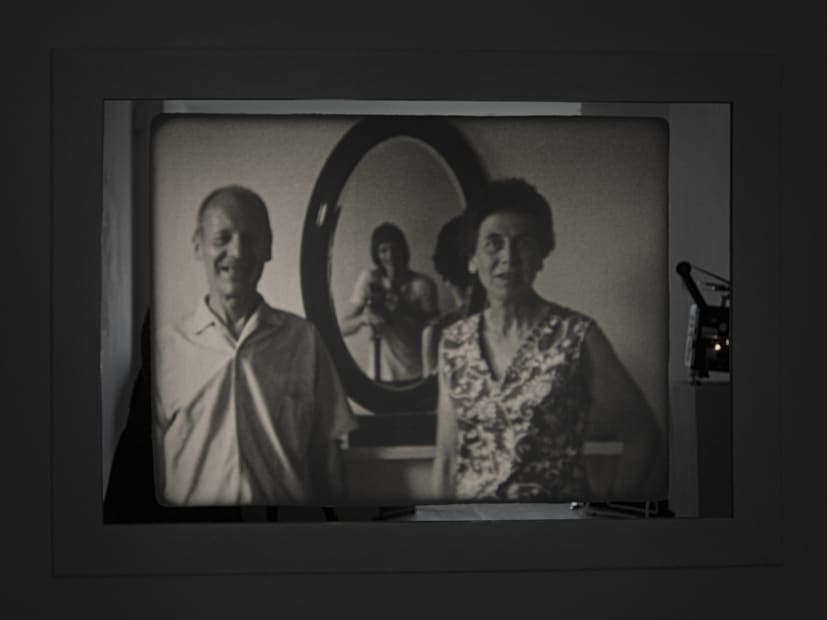 Guy Sherwin Portrait with Parents #2, 2016 (1975) Installation for 16mm projector, mirror, paint, 3 minute film loop (GSN004)