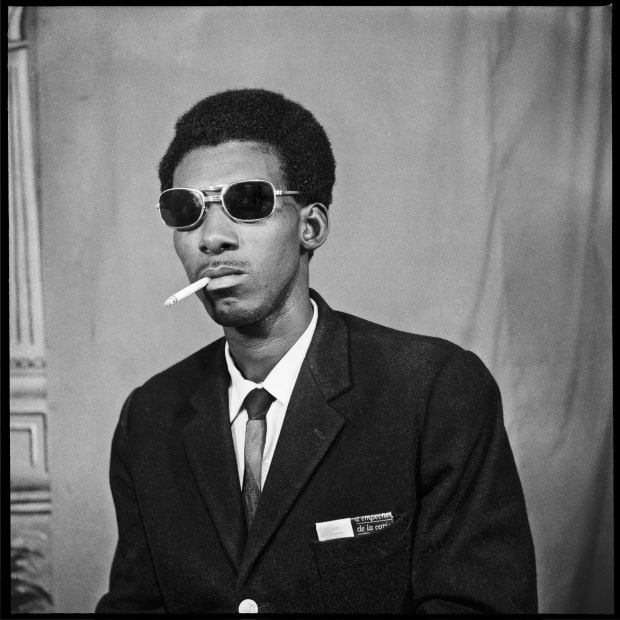SANLÉ SORY, Le Vendeur Sénégalais qui Fume, 1972
