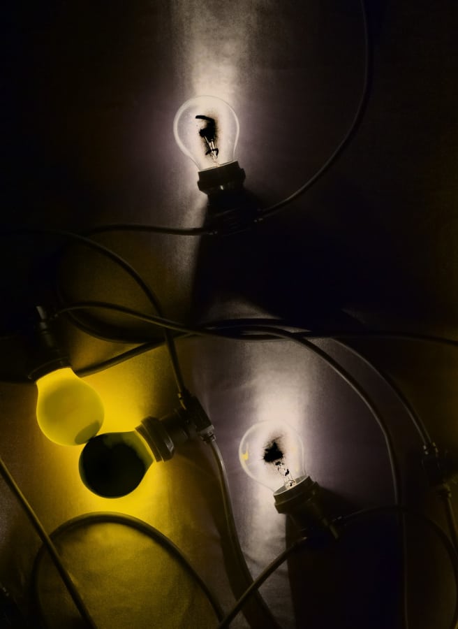 Artwork: João Penalva, Four light bulbs, yellow and clear, 2013