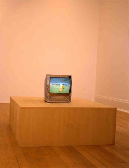 Paul Pfeiffer  Caryatid, 2003  chromed monitor / DVD player, DVD, plexiglass & wood case