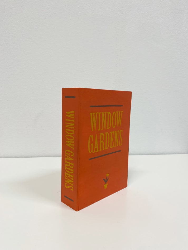orange book with yellow cover title 